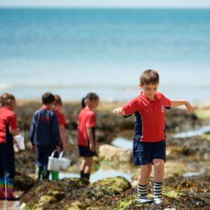 students at the beach