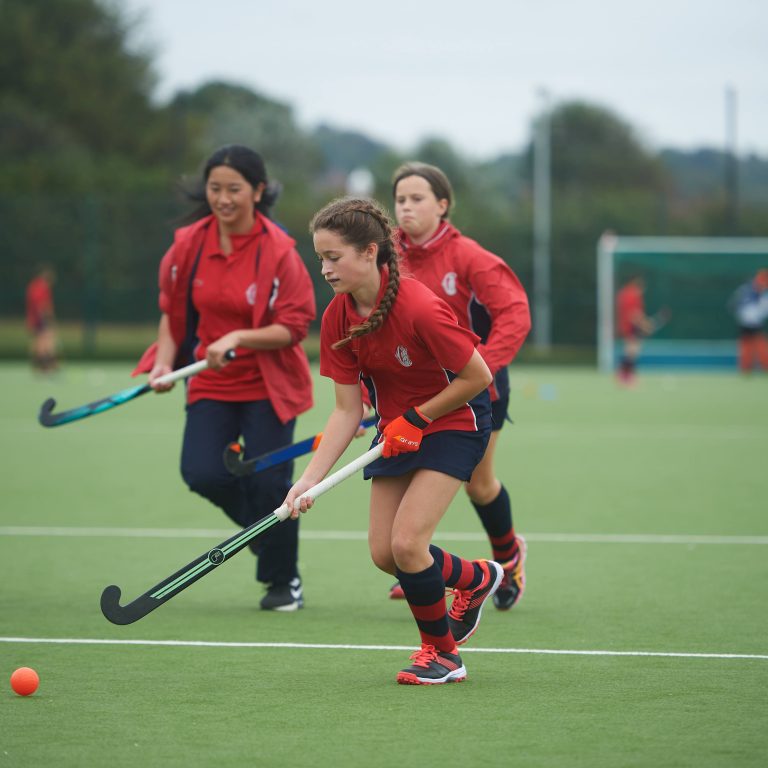 students playing hockey