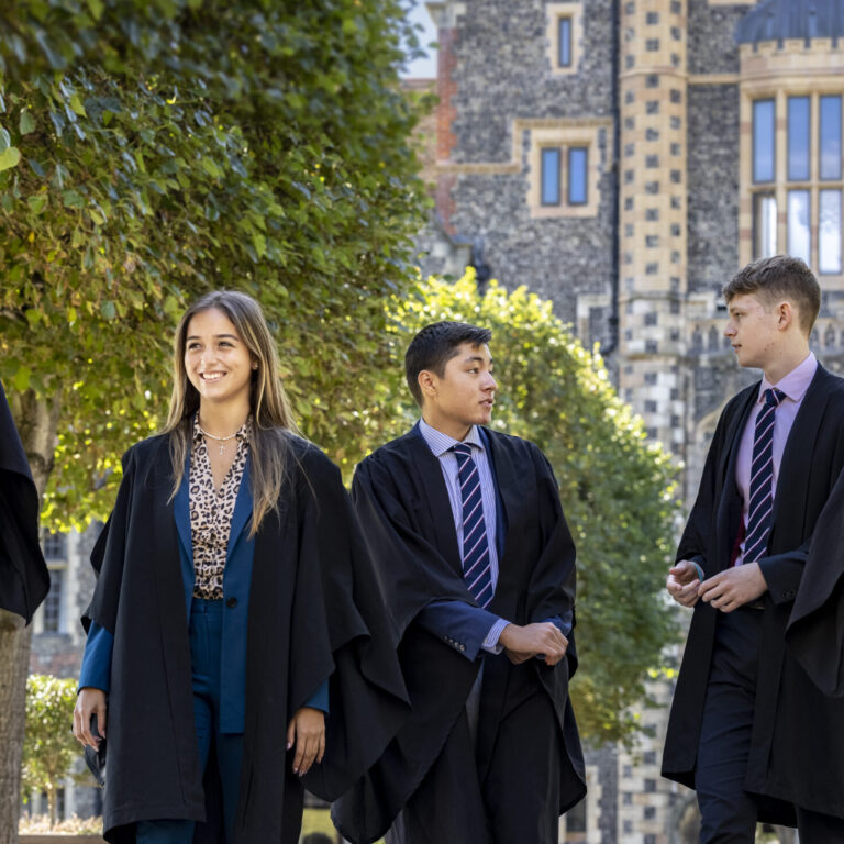 Students dressed formally, walking to class