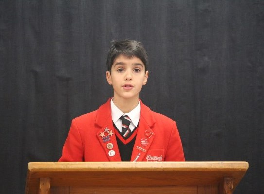 Student on plinth