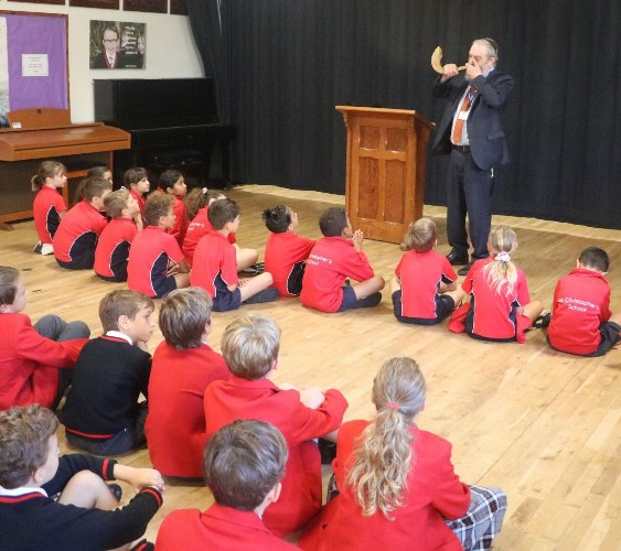 Students listening to a teacher