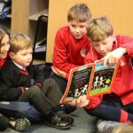 students reading together
