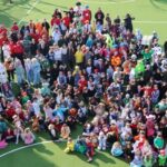 crowd of teachers and students
